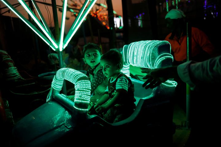 Photographer Danish Siddiqui capture children enjoying a ride at a fair in Mumbai, India, December 27, 2018. REUTERS/Danish S
