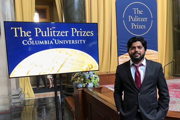 Danish Siddiqui, a Reuters photographer based in India, poses for a picture at Columbia University's Low Memorial Library dur