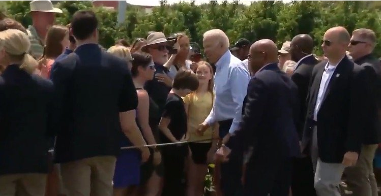 “What Am I Doing?” Asks a Confused Joe Biden While Shaking Hands with People Image-241