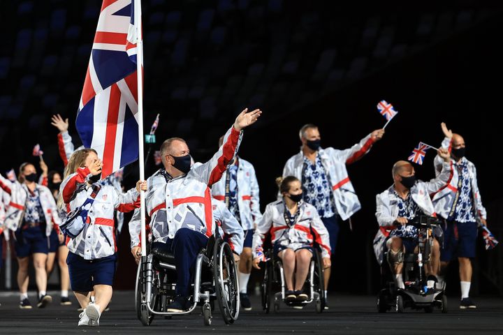 Flag bearers Eleanor Simmonds and John Stubbs of Team Great Britain lead their delegation in the parade of athletes during th
