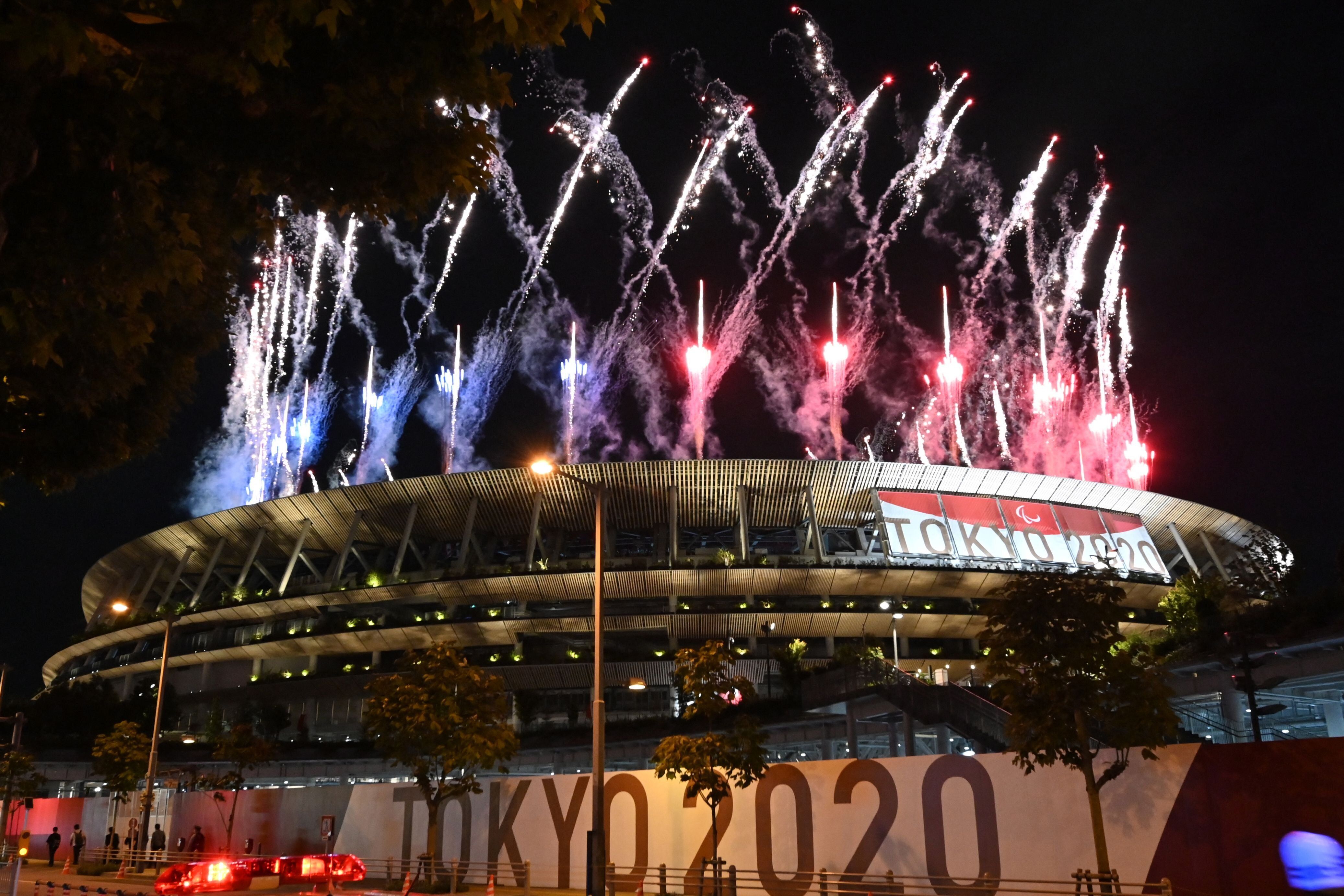 Fireworks light up the sky above the Olympic Stadium during the opening ceremony for the Tokyo 2020 Paralympic Games.