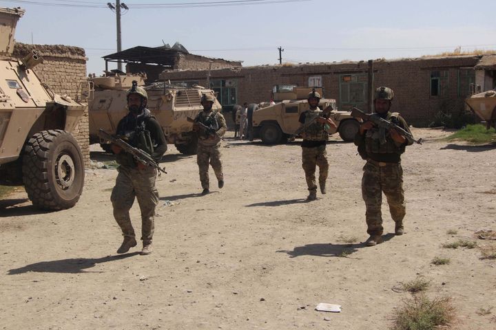 Afghan special force members attend a military operation against the Taliban fighters in Kandak Anayat village of Kunduz city