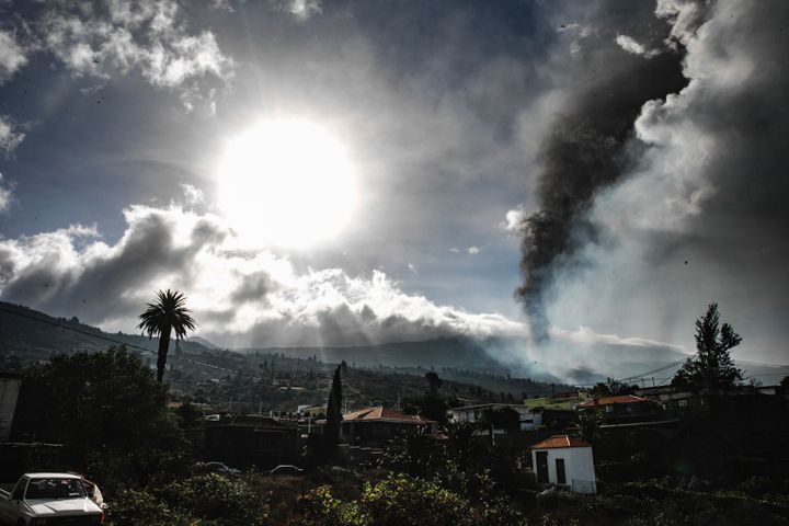 Smoke billows from a volcano near Los Llanos de Ariadne on the island of La Palma in the Canaries, Spain, on Sept. 21, 2021.&