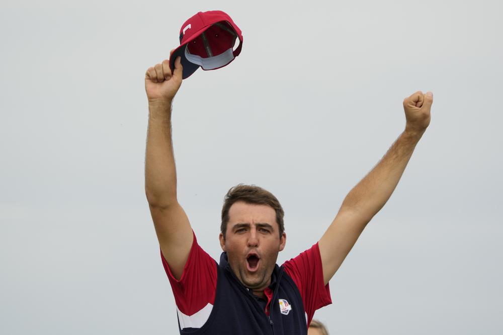 Team USA's Scottie Scheffler reacts on the 15th hole during a Ryder Cup singles match at the Whistling Straits Golf Course Sunday, Sept. 26, 2021, in Sheboygan, Wis. (AP Photo/Charlie Neibergall)