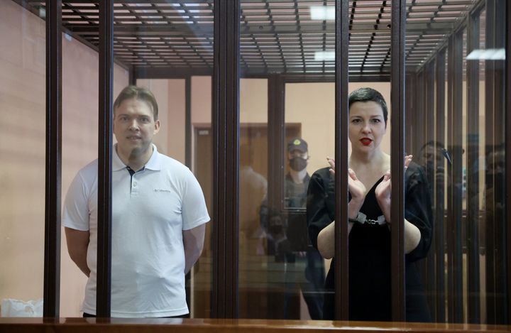 Belarusian opposition activists Maxim Znak, left, and Maria Kolesnikova appear for a sentencing hearing at the Minsk Region C