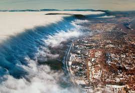 My hometown of Bluefield. West Virginia in the foreground; Virginia in the distance. (Photo: Grubb, Melvin, "Fog over East River Mt., 1993." (1993). 0227: Marshall University Regional Photograph Collection.)