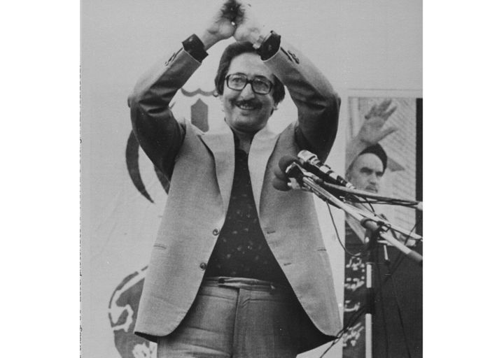 Then Iranian President Abolhassan Banisadr acknowledges cheers after speaking to thousands of Iranians in front of the U.S. Embassy in Tehran, on June 16, 1980. 