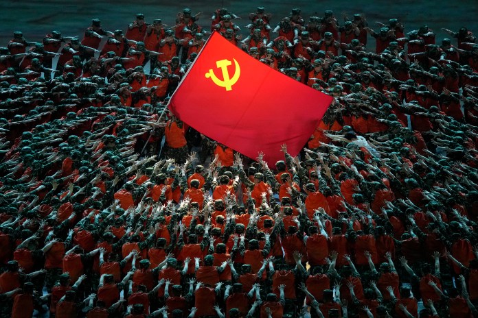 people surround CCP flag