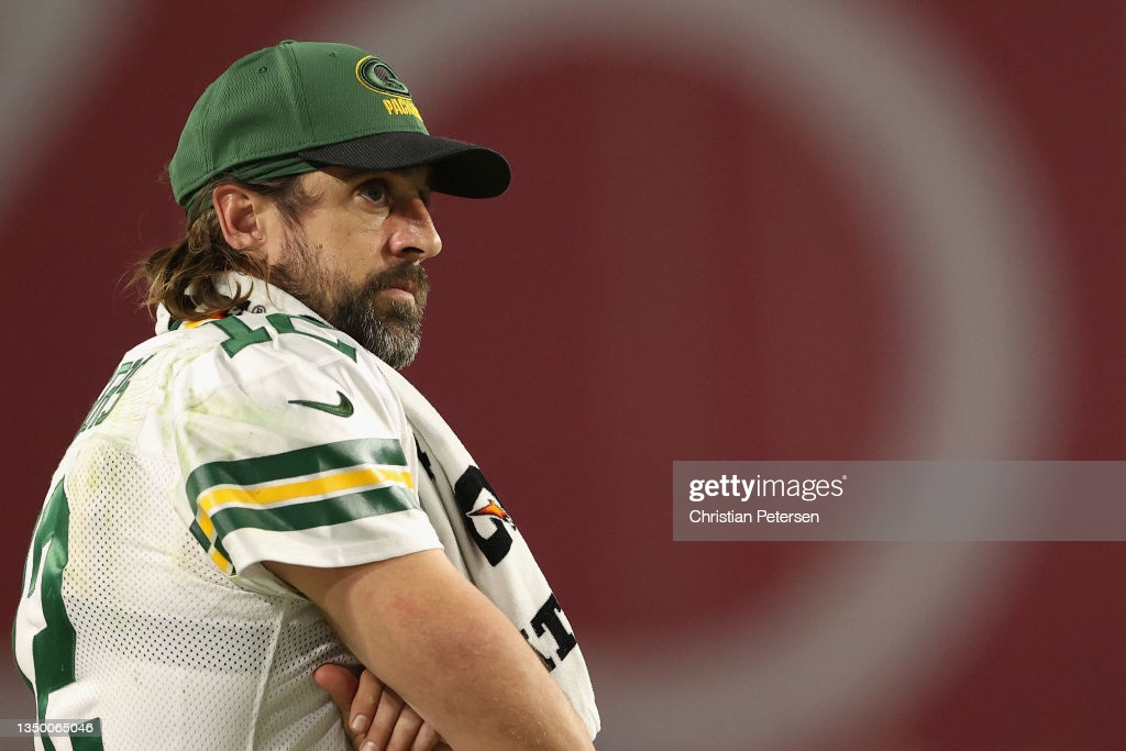 Quarterback Aaron Rodgers of the Green Bay Packers watches from the sidelines during the second half of the NFL game at State Farm Stadium on October...