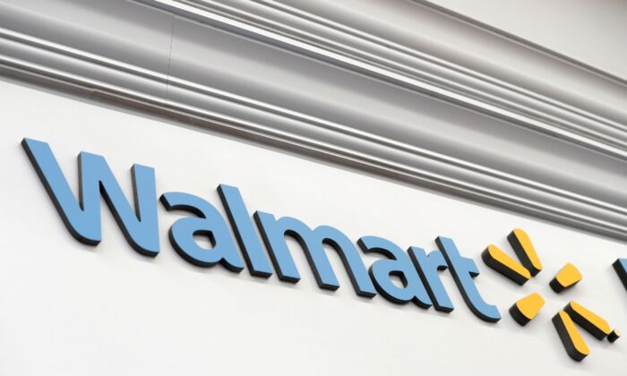 A Walmart sign is seen inside its department store in West Haven, Conn., on Feb. 17, 2021. (Mike Segar/Reuters)