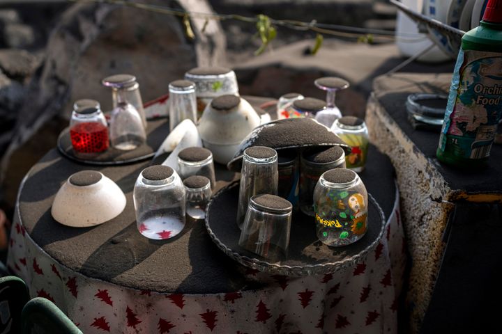 A crockery set left behind by residents who were evacuated from their village.