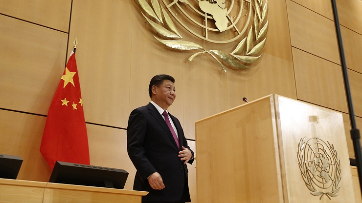 Chinese President Xi delivers a speech during a high-level event in the Assembly Hall at the United Nations European headquarters in Geneva
