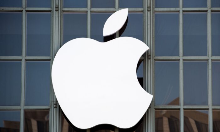 The Apple logo is seen on the outside of Bill Graham Civic Auditorium before the start of an event in San Francisco, Calif., on Sept. 7, 2016. (Josh Edelson/AFP via Getty Images)