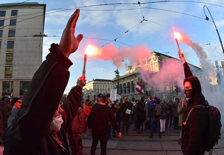 Demonstrators light flares during a rally held by Austria's far-right Freedom Party.