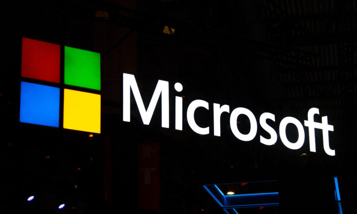 A logo sits illumintated outside the Microsoft booth on day 2 of the GSMA Mobile World Congress 2019 in Barcelona, Spain, on Feb. 26, 2019. (David Ramos/Getty Images)