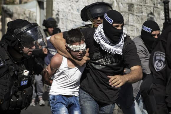 File photo of a Palestinian child being arrested in Jerusalem, from the Addameer Prisoner Support and Human Rights Association site.