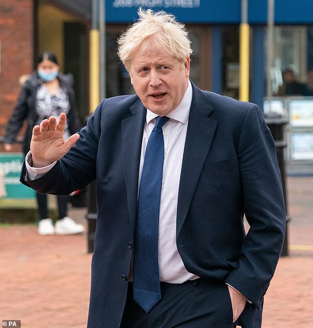 Boris Johnson is said to be looking at cutting the period for self-isolation after a positive test from seven to five days