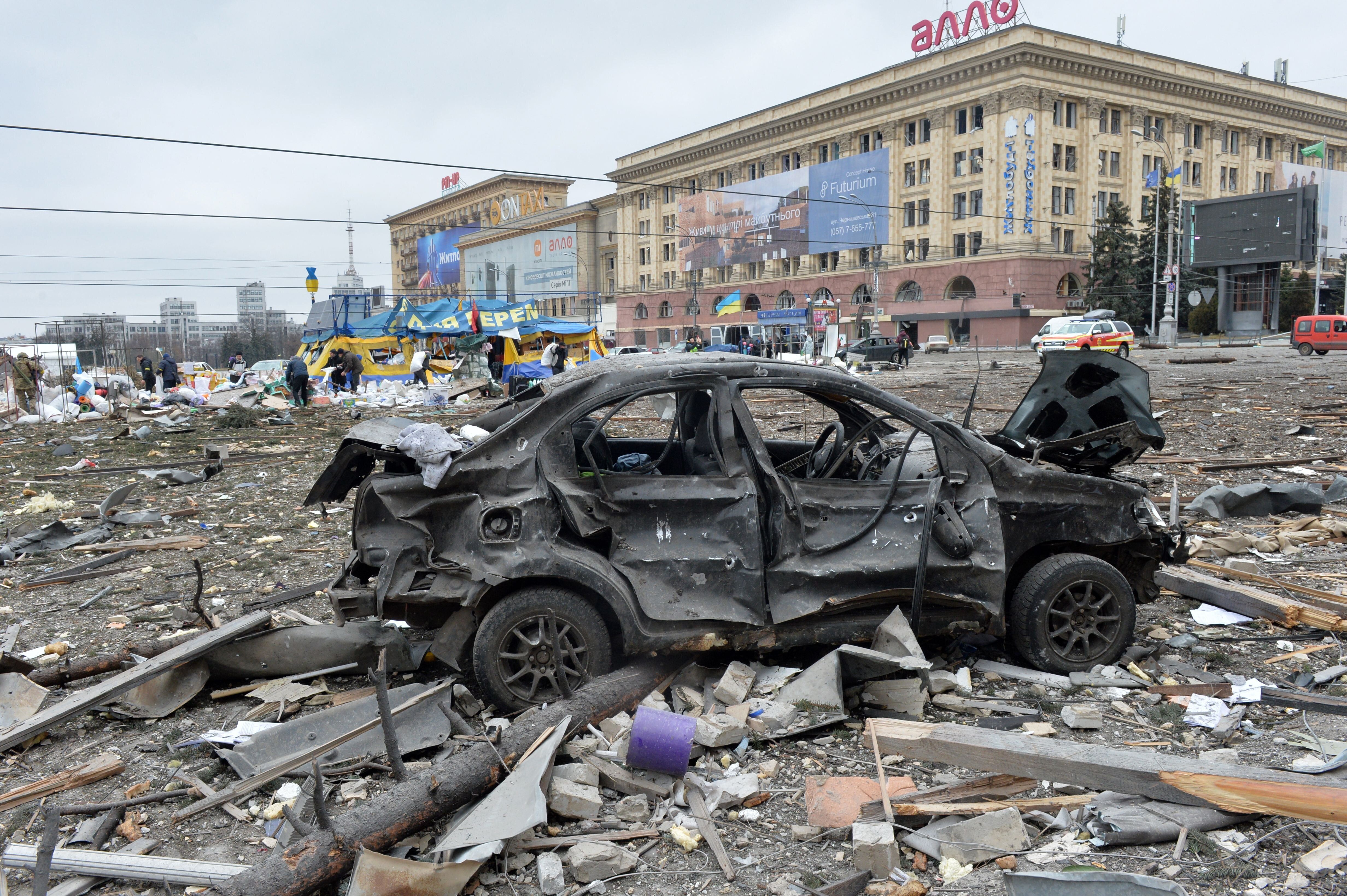 A view of the square outside the damaged local city hall of Kharkiv on March 1, 2022, destroyed as a result of Russian troop shelling. (Photo by SERGEY BOBOK/AFP via Getty Images)