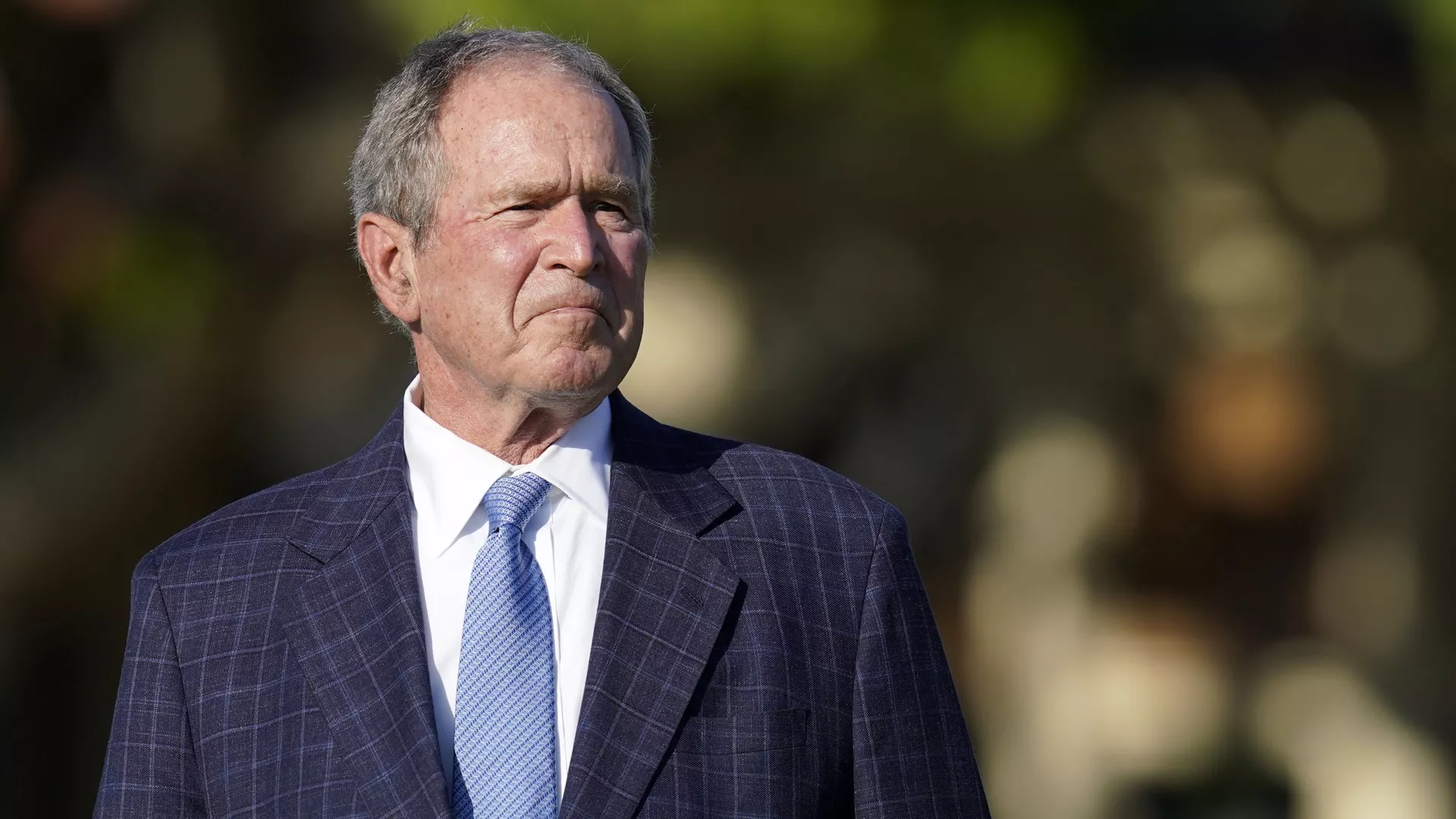 Former President George W. Bush listens to speakers during the opening ceremony of the Walker Cup golf tournament, which starts tomorrow, at Seminole Golf Club in Juno Beach, Fla., Friday, May 7, 2021. The tournament was founded by George Herbert Walker, the United States Golf Association president in 1920, who was the great-grandfather of Bush. - Sputnik International, 1920, 19.05.2022