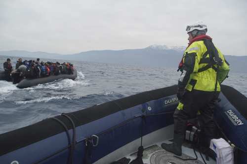 Refugees crossing the Mediterranean sea on a boat, heading from Turkish coast to the northeastern Greek island of Lesbos, 29 January 2016.