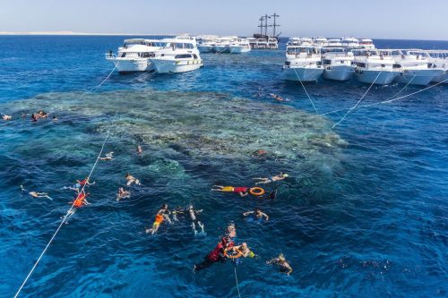 A picture taken on September 29, 2021 shows Russian tourists in the Egyptian Red Sea resort of Sharm el-Sheikh. [KHALED DESOUKI/AFP via Getty Images]