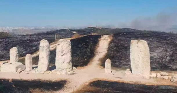The aftermath of the Gezer fire of early July 2022 shown in this image reveals that ancient stone ruins can survive grass fires, but that climate change is making more fires overall. Source: Roee Shtrauss / INPA