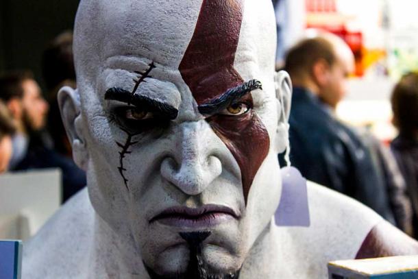 A closeup of Kratos the Greek god of strength, might and power as depicted in the popular video-game series God of War. Source: Matteo Pedrini / CC BY-SA 2.0