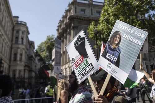 LONDON, UNITED KINGDOM - MAY 14: People gather to protest the killing of Al Jazeera journalist Shireen Abu Akleh while covering an Israeli raid in West Bank, within events markings the 74th anniversary of the Nakba, also known as Day of the Catastrophe in 1948, in London, United Kingdom on May 14, 2022. ( Raşid Necati Aslım - Anadolu Agency )