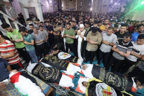 Palestinians hold funerals for those martyred in Israeli strikes on the Gaza Strip on 5 August 2022 [Mohammed Asad/Middle East Monitor]