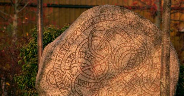 A large Viking rune stone depicting the Midgard serpent in Trelleborg Sweden. Source: Lars Gieger / Adobe Stock