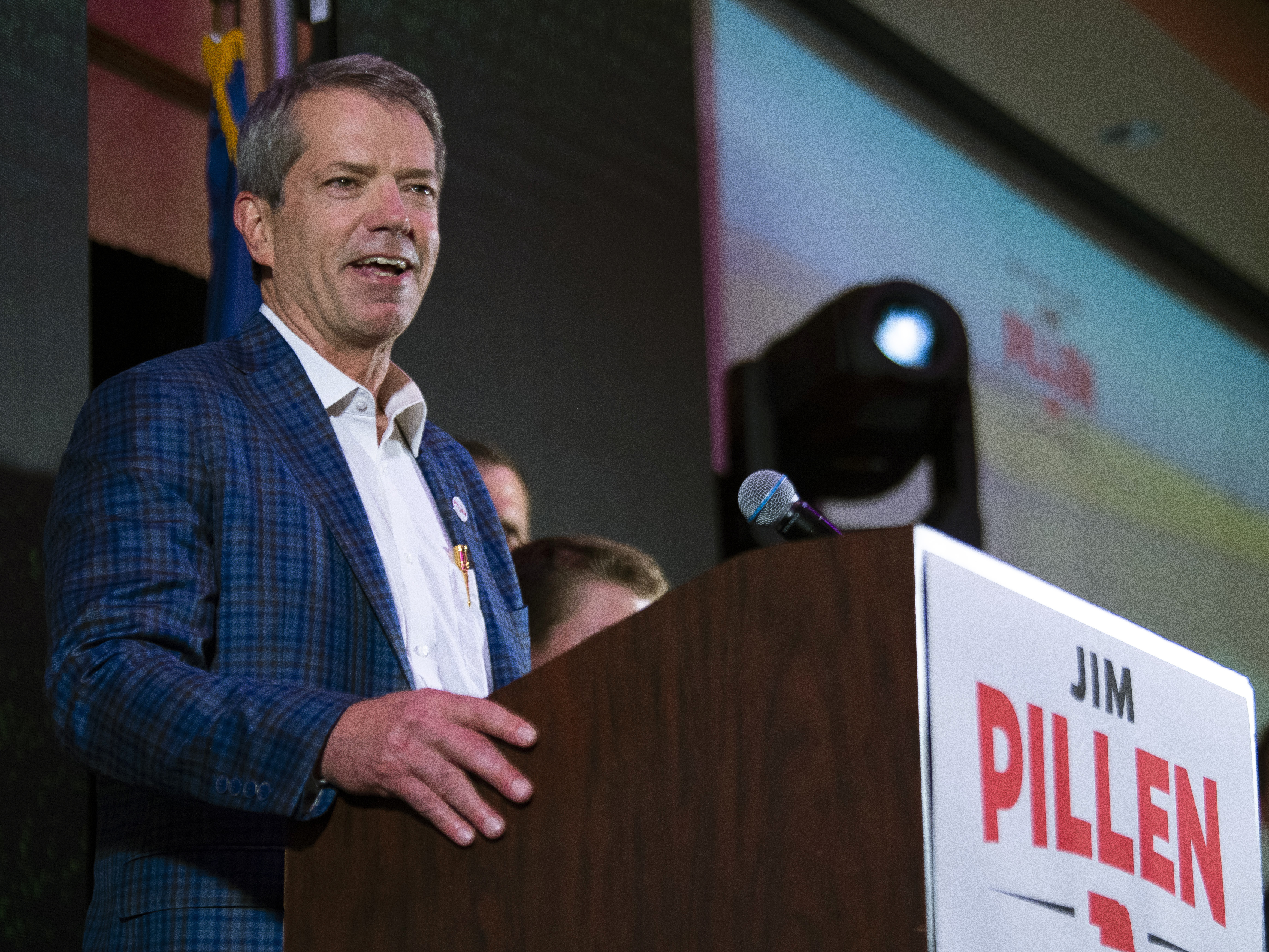 Jim Pillen smiles to applause as he is named the winner of the Nebraska Republican gubernatorial primary during an election night party on May 10, 2022, in Lincoln, Neb.