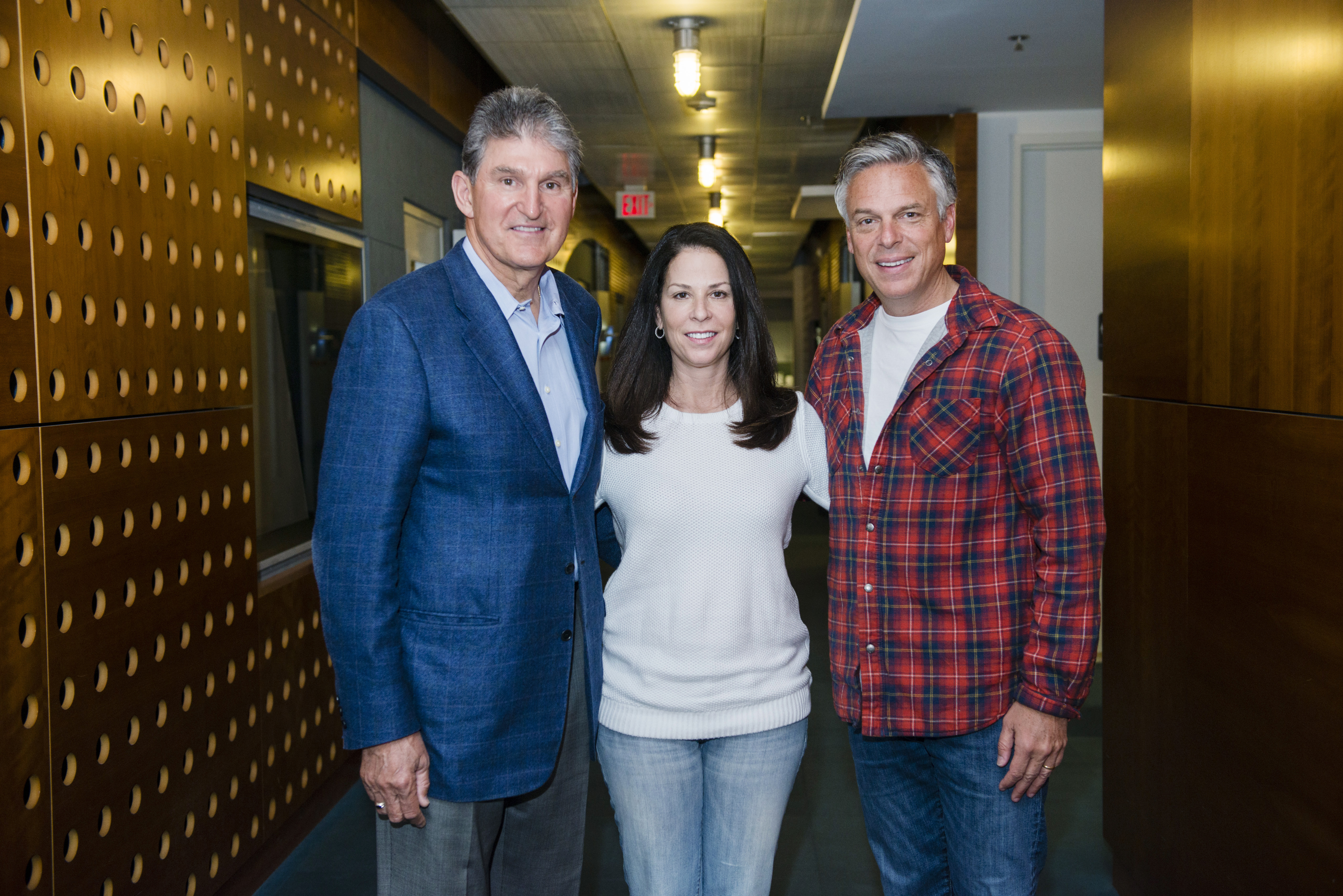 Senator Joe Manchin (L), Nancy Jacobson, founder and president of No Labels (M), and Governor Jon Huntsman (R), pose for a photo following SiriusXM's No Labels Radio program at the SiriusXM Studio on May 3, 2014 in Washington, D.C.
