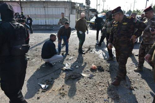 Security forces stand guard at the scene after 3 bomb explosions in the city of Kirkuk in northern Iraq on November 30, 2019 [Ali Mukarrem Garip/via Getty Images]