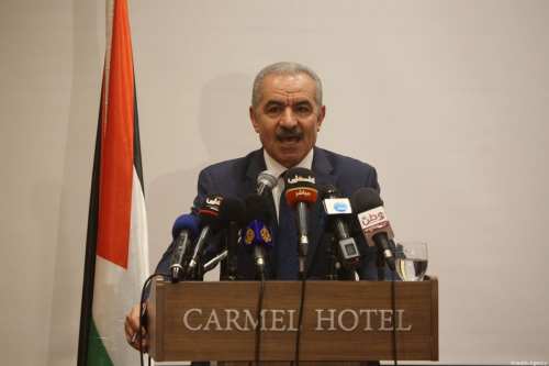 Palestinian Prime Minister Mohammed Shtayyeh speaks to press in Ramallah, West Bank on 30 July 2019 [Issam Rimawi/Anadolu Agency]
