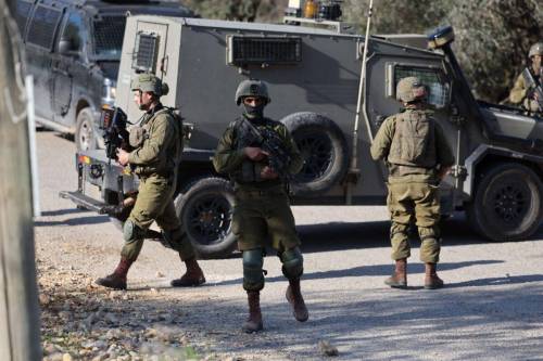 Members of Israeli security forces close-off the area of a reported stabbing attack northwest of Ramallah in the occupied West Bank, on January 21, 2023 [AHMAD GHARABLI/AFP via Getty Images]