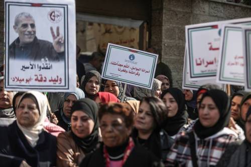 People gather in front of International Committee of the Red Cross (ICRC) for the protest over Palestinian prisoners in Israeli jails, in Gaza City, Gaza on February 20, 2023. [Ali Jadallah - Anadolu Agency]