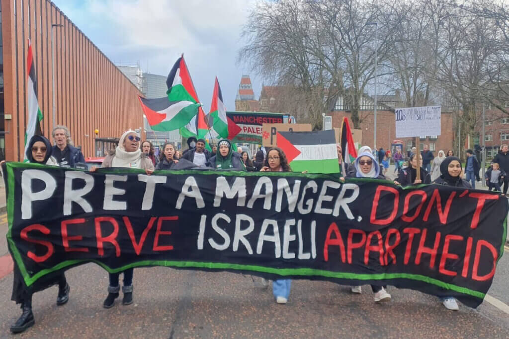 University of Manchester Friends of Palestine and Youth Front for Palestine lead a demonstration through the Manchester streets and into the stores of food retailer Pret A Manger to protest their plans for 40 new stores in Apartheid Israel, February 23 2023 (Photo: Youth Front for Palestine)
