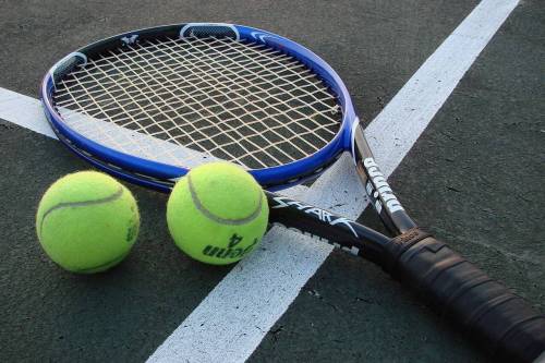 A modern tennis racket, with carbon fiber-reinforced polymer frame [wikipedia]