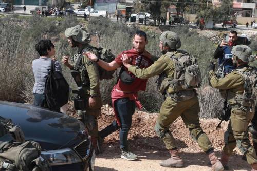 Israeli forces take protesters into custody during a demonstration in support of Palestinians in Huwwara, those who were subjected to Jewish settlers' violence, in Nablus, West Bank on March 03, 2023. [Issam Rimawi - Anadolu Agency]