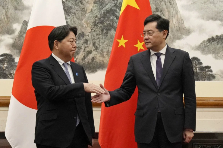 Japan's Yoshimasa Hayashi in China. China-Japan relations. China Japan