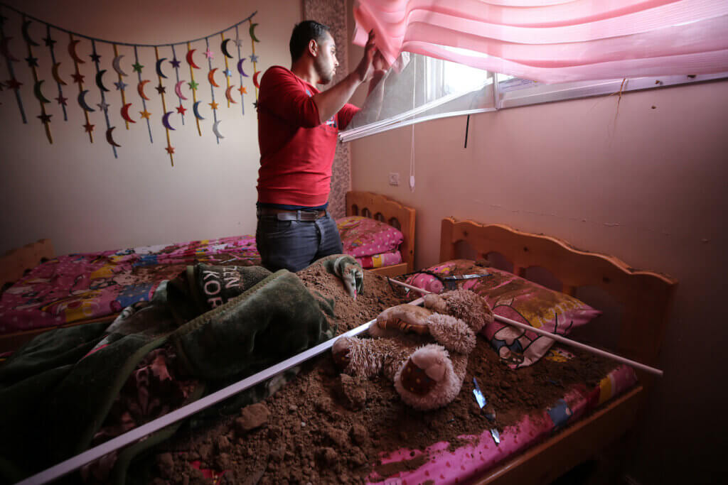 A Palestinian inspects damage to his house after Israel launched air strikes on the Palestinian enclave early on April 7, 2023. (Photo: Majdi Fathi/NurPhoto via ZUMA Press/APA images)