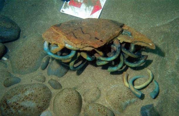 Some of the 313 manillas (brass rings) excavated by the Sociedad de Ciencias Aranzadi from a Flemish trader lost in 1524 off Getaria in Basque Country, northern Spain which prove the source of the Benin Bronze metal. Source: Ana Maria Benito-Dominguez/CC-BY 4.0/PLoS ONE